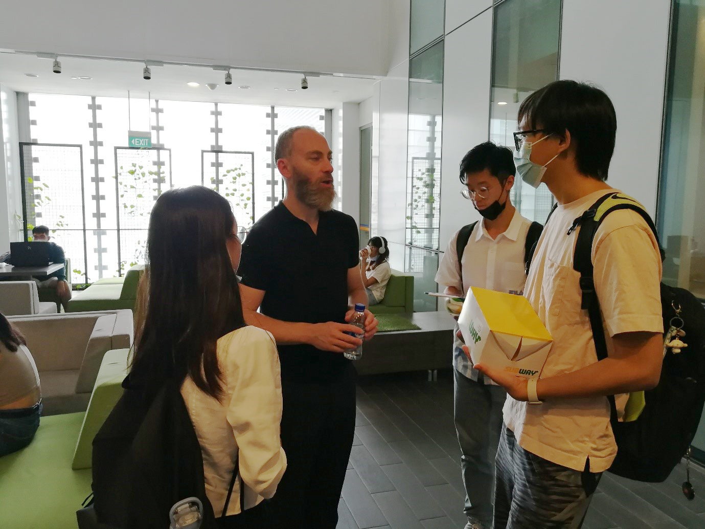 Dr. Deremble addressing the queries from students who stayed on after the seminar