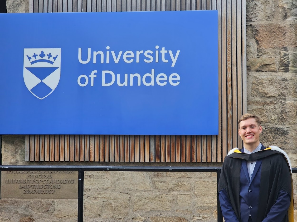 In front of Tower Building on graduation day