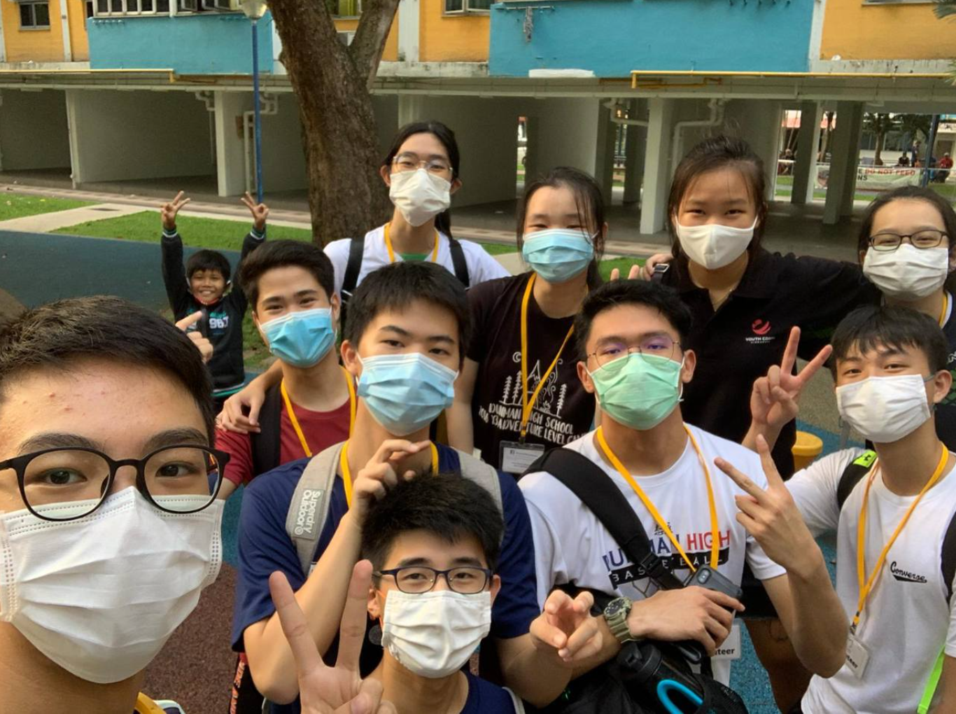 Tongyu (3rd from right) bringing nine of her classmates to volunteer at the Youth Corps Leaders Programme.