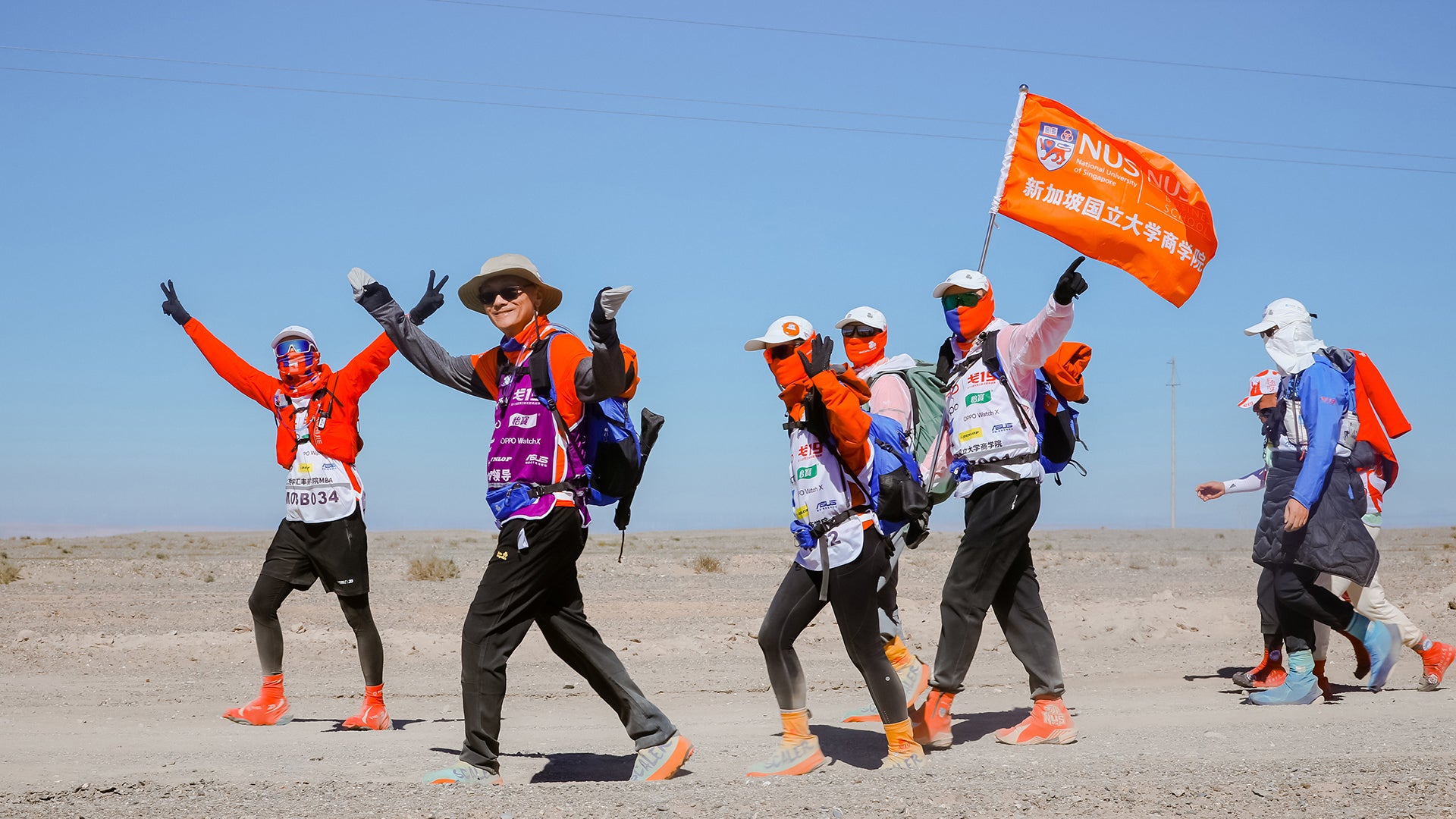 NUS President Professor Tan Eng Chye (second from left) was part of the team from NUS that participated in the 19th Gobi Desert Challenge held from 1 to 4 October 2024. This was his fifth time trekking through the desert.