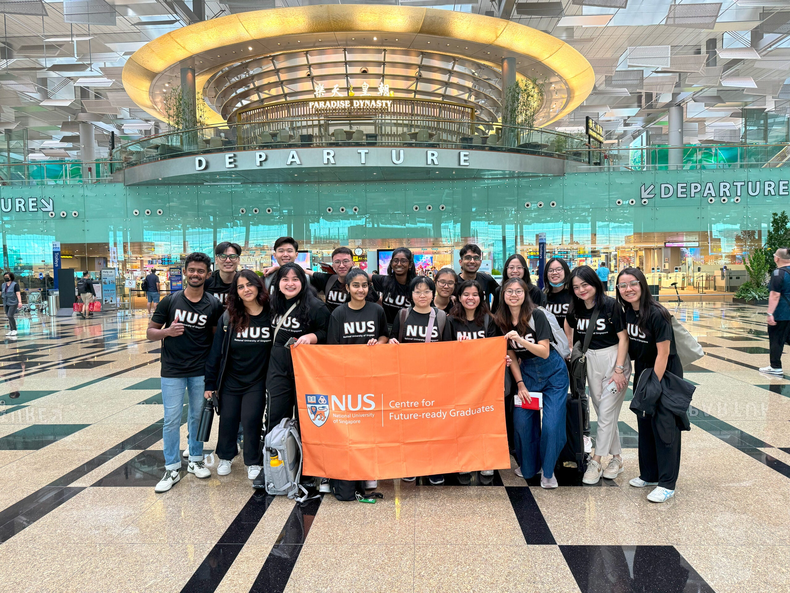 Group photo at the airport at the start of the trip